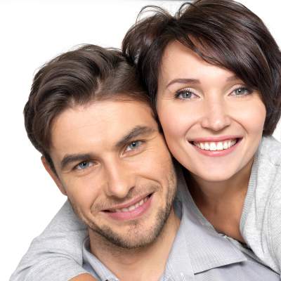 Man and woman smiling 